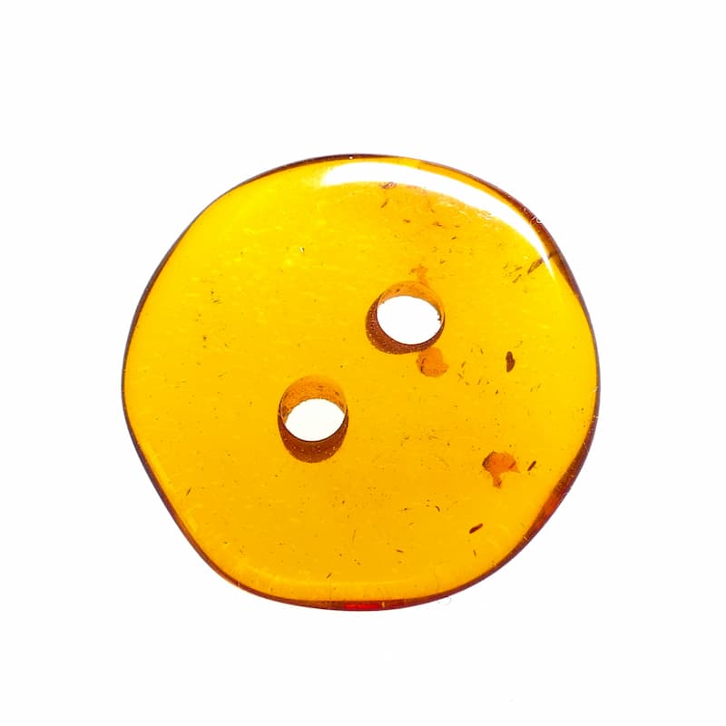 Unique honey color amber button - 2 holes